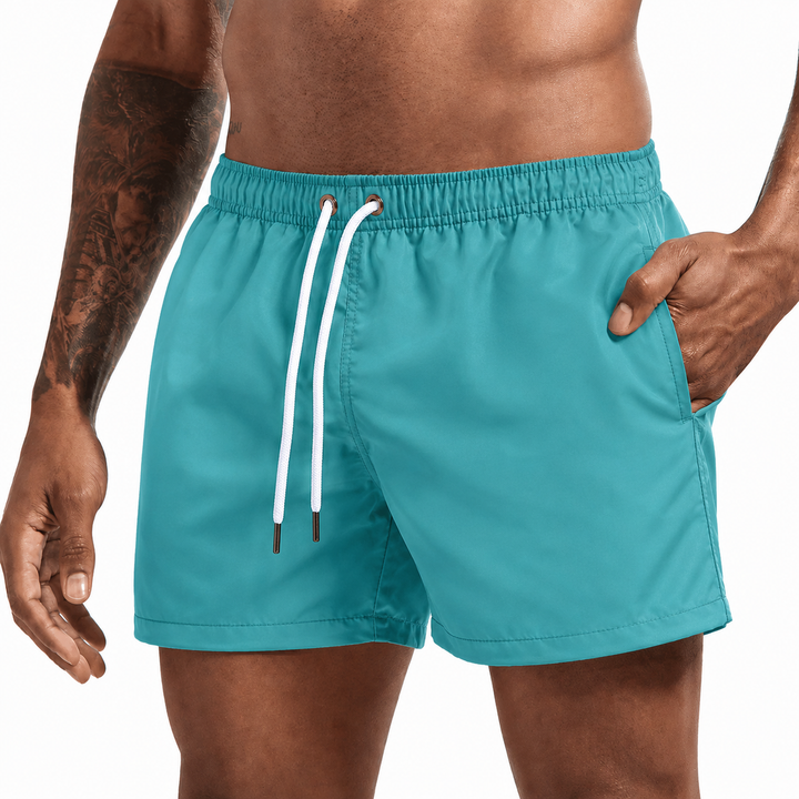 Sneldrogende heren zwemshort, kort, met trekkoord en zijzakken, essentieel voor je zomerse garderobe.