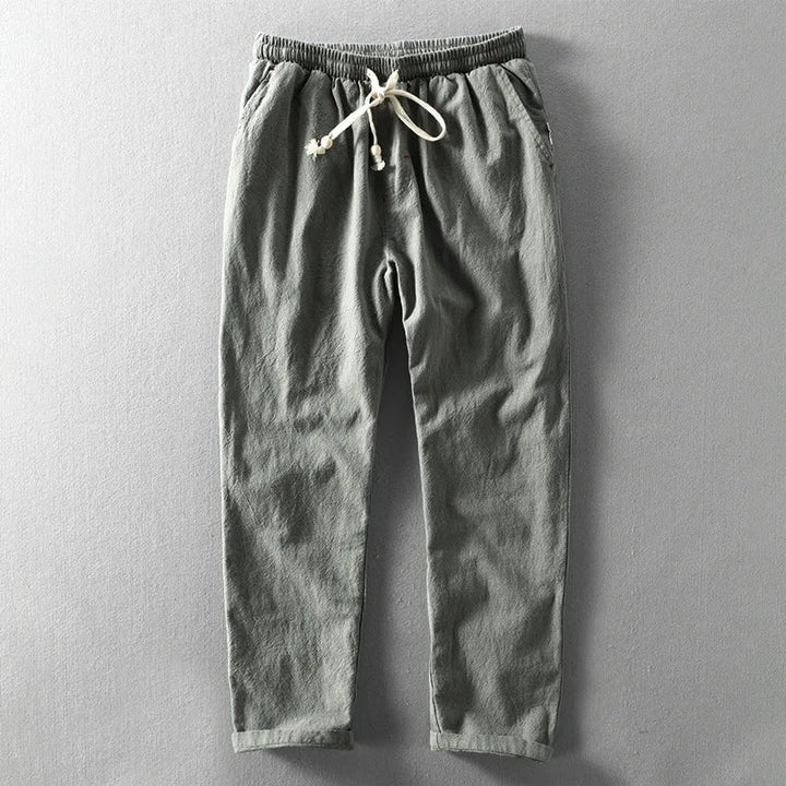 Rechte pijp van de moderne herenbroek met elastische taille, ideaal voor een relaxte maar stijlvolle uitstraling.
