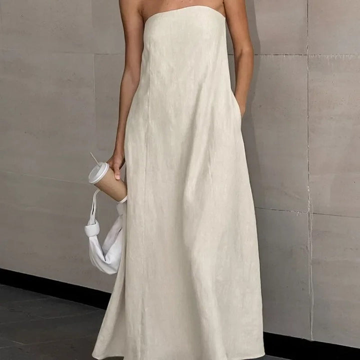 Elegante losvallende dames strapless maxi jurk in khaki, perfect voor zomerse dagen en strandvakanties.