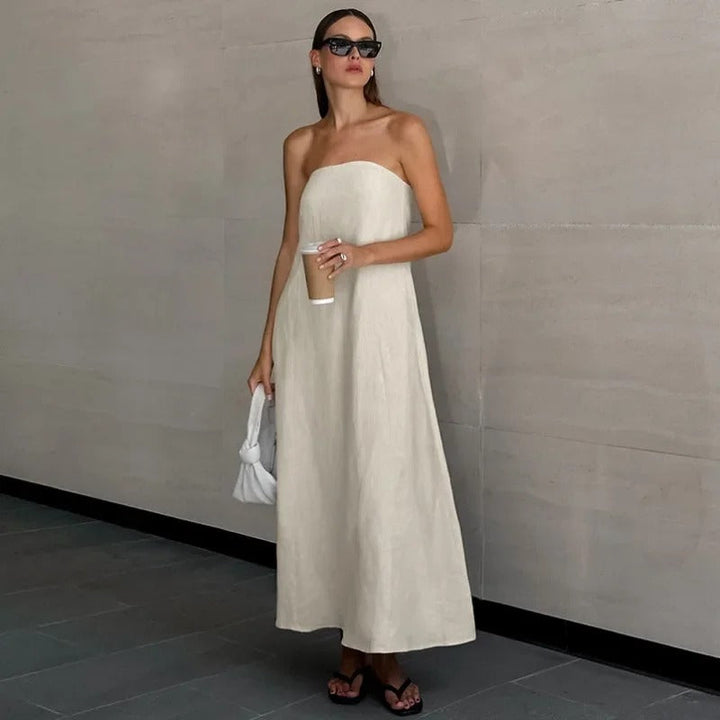 Dames strapless maxi jurk in khaki, luchtig en losvallend. Comfortabele zomerjurk voor casual of strandgebruik.