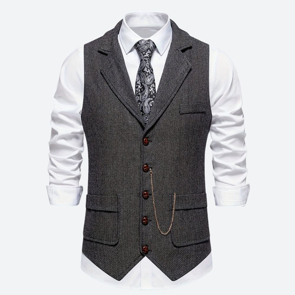 Klassiek herengilet met visgraatmotief, stijlvol en tijdloos, ideaal voor formele en zakelijke gelegenheden.