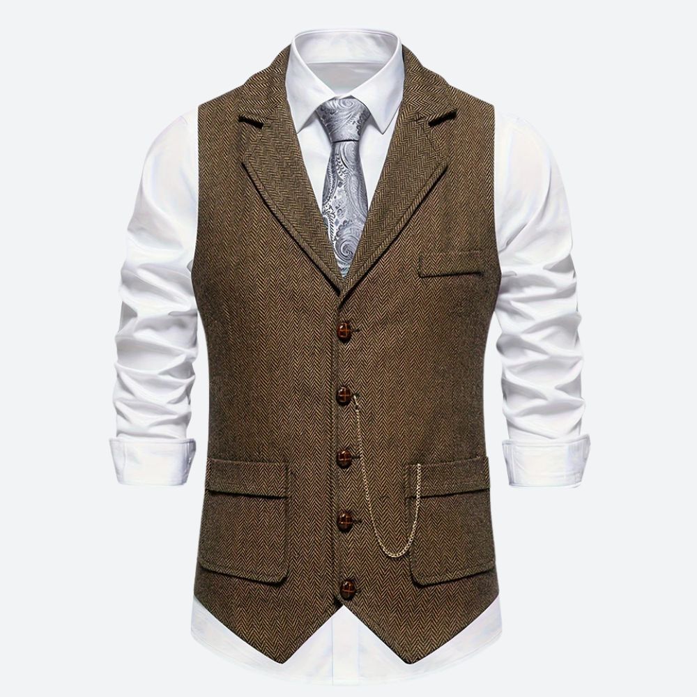 Klassiek herengilet met visgraatmotief, stijlvol en tijdloos, ideaal voor formele en zakelijke gelegenheden.