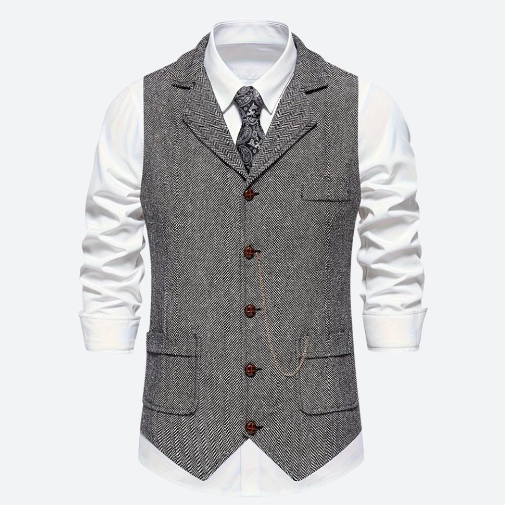 Klassiek herengilet met visgraatmotief, stijlvol en tijdloos, ideaal voor formele en zakelijke gelegenheden.