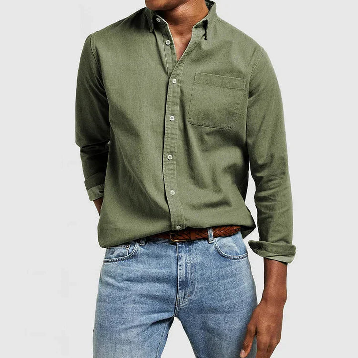 "Klassiek herenoverhemd van hoogwaardige katoen in diverse kleuren, perfect voor zakelijke en casual gelegenheden."
