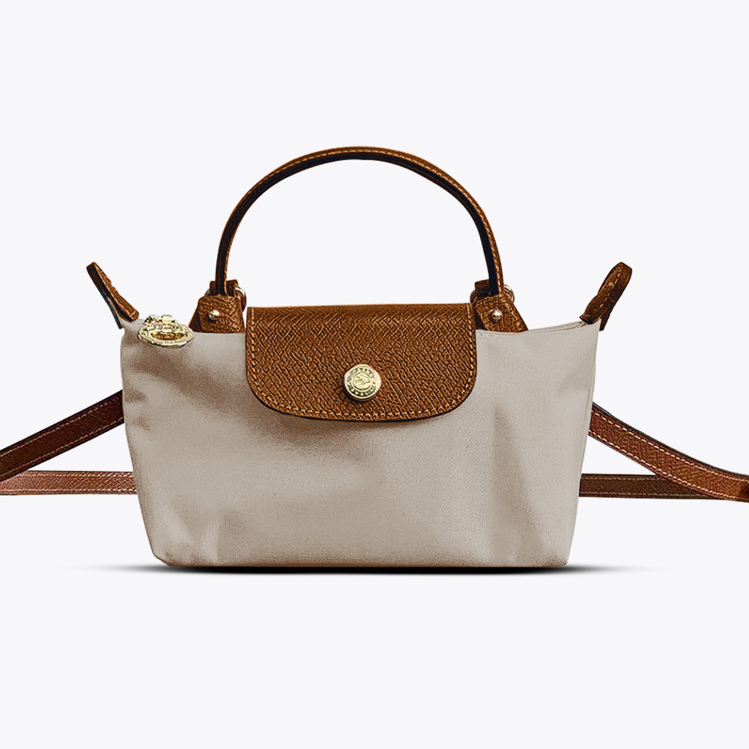 Stijlvolle beige mini crossbody tas voor dames, compact & functioneel, ideaal voor een modieuze look.
