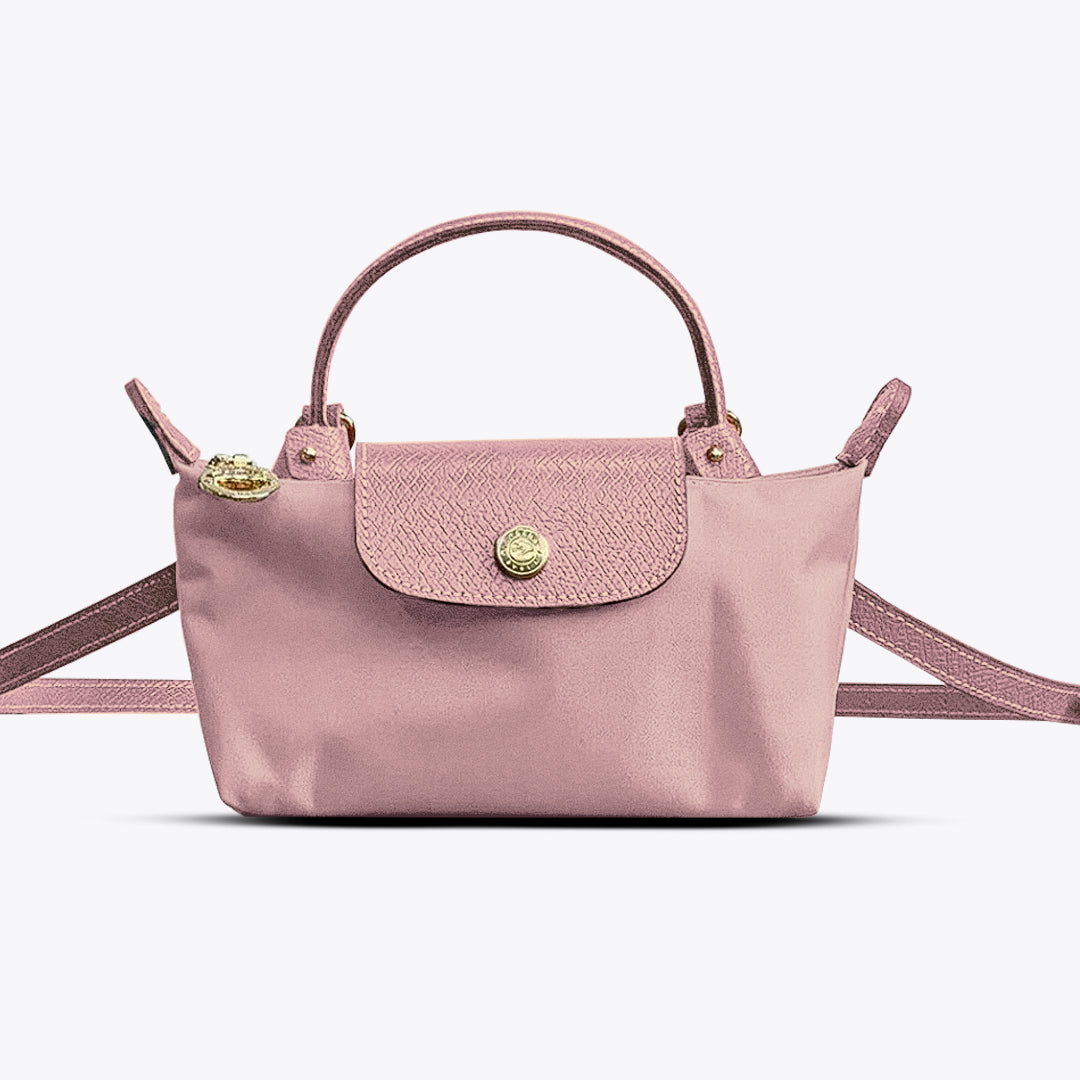 Praktische roze mini crossbody tas voor dames met ruime indeling, perfect voor mobiel, portemonnee & sleutels.