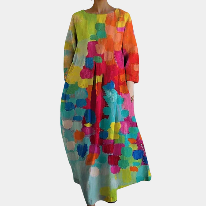 "Kleurrijke lange damesjurk voor zomer, luchtige stof, beschikbaar in vijf kleuren, elegant en casual voor elke gelegenheid."