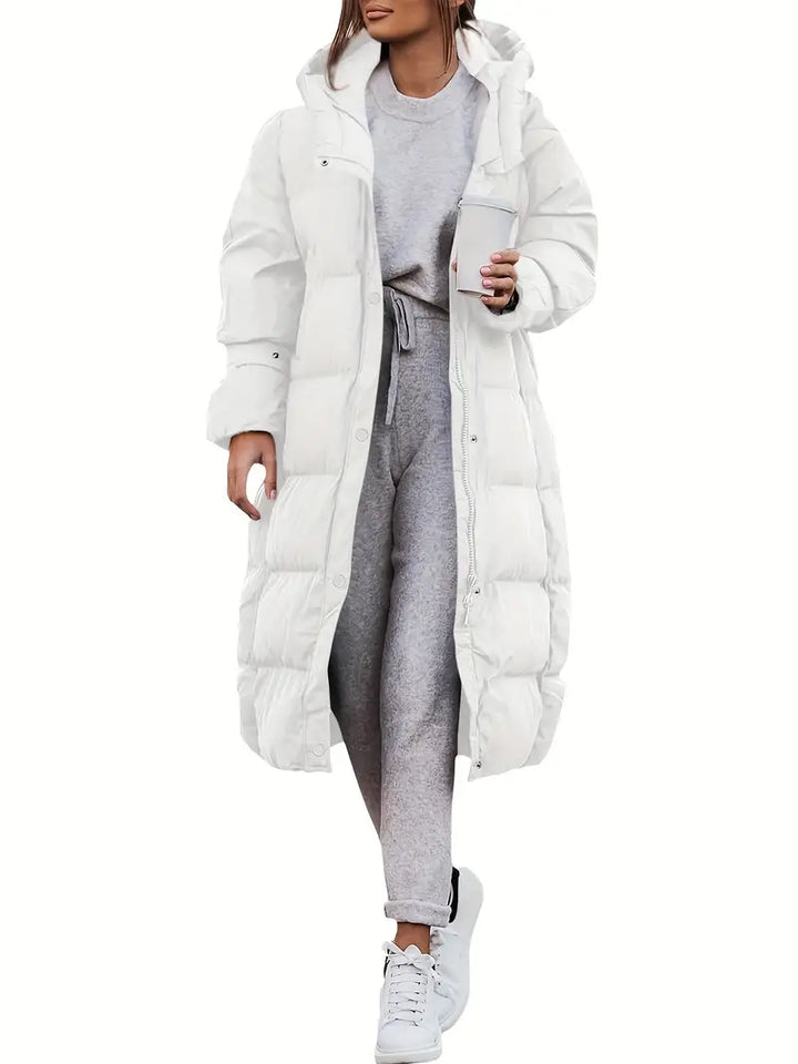 "Lange dames winterjas met waterdicht teddy design, ademende stof en elegante uitstraling, ideaal voor koud weer."