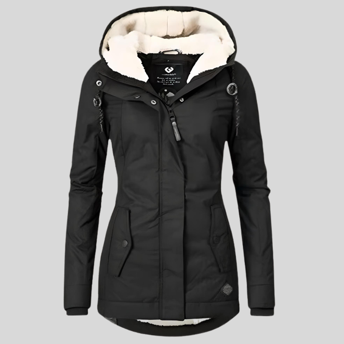 Dames lange winterjas, waterafstotend en gevoerd, met verstelbare capuchon. Essentieel voor warmte en comfort buiten.