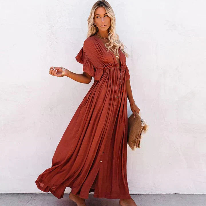 "Lange rode strandjurk dames, elegant design, vloeiende snit, katoen-polyester mix, ideaal voor zonnige dagen."