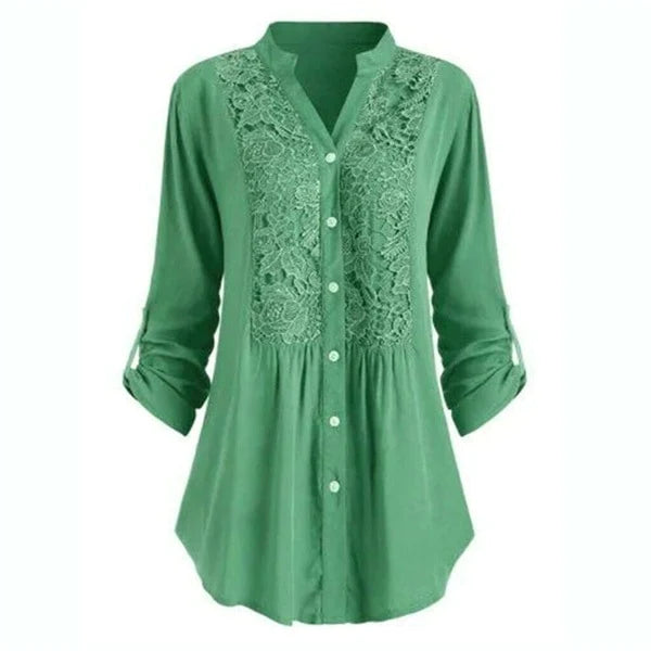 Vrouwenkleding: lange blouse Noelle met sierlijke pofmouwen, geschikt voor diverse gelegenheden.