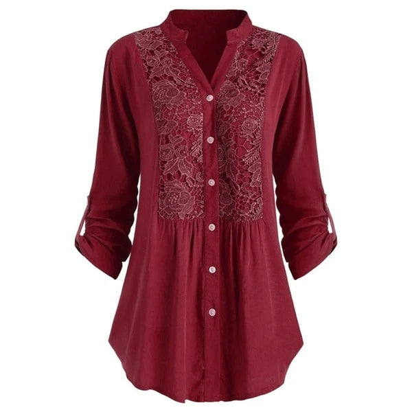 Stijlvolle blouse Noelle met unieke pofmouwen, een elegante keuze voor elke zakelijke of casual setting.