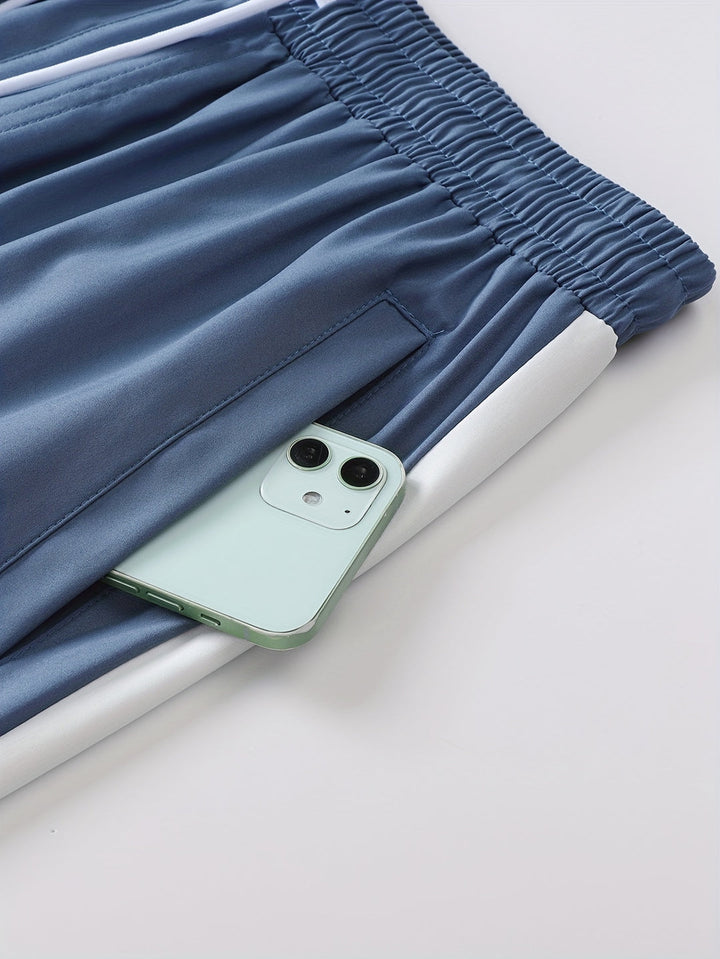 Comfortabel, lichtgewicht en ademend heren trainingspak, geschikt als joggingpak of casual sportkleding.