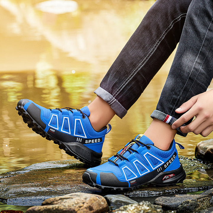 Lichtgewicht waterdichte wandelschoenen, unisex, met antislipzool voor grip op natte paden.