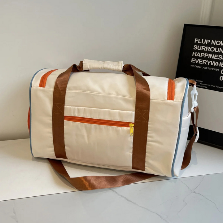 Compacte FlexaBag weekendtas met kleurblokken, makkelijk mee te nemen als bagage voor sport of korte reizen.