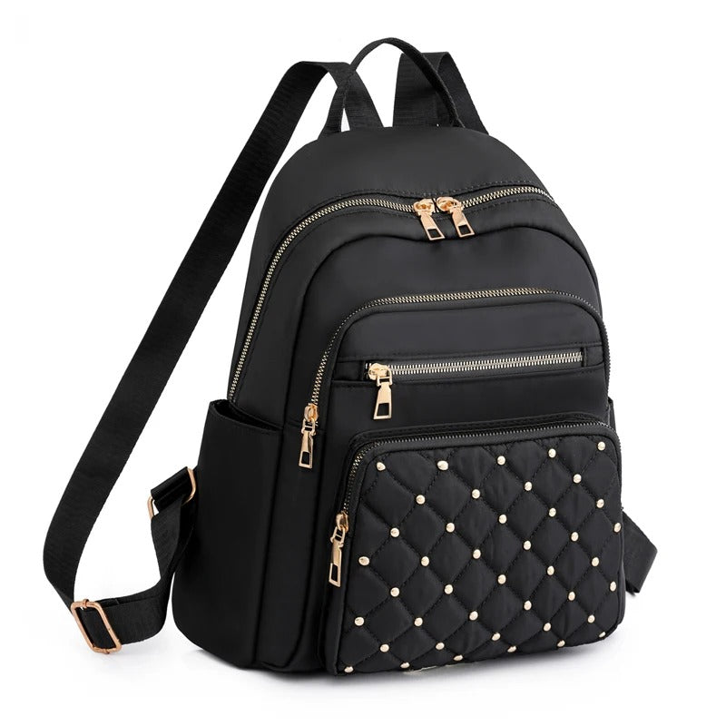Lichtgewicht waterdichte nylon dames rugzak, ideaal voor school, reizen of dagelijks gebruik.