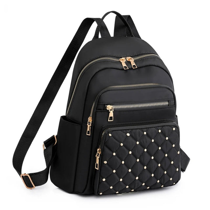 Lichtgewicht waterdichte nylon dames rugzak, ideaal voor school, reizen of dagelijks gebruik.
