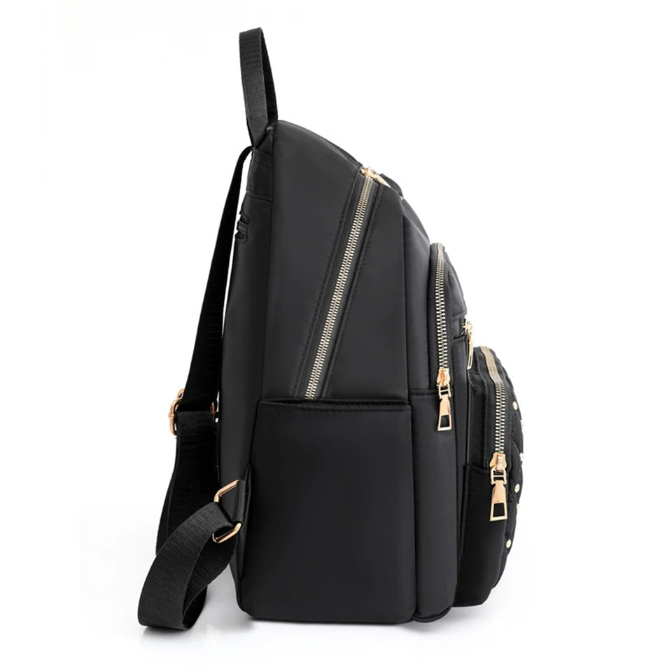 Veelzijdige waterdichte dames rugzak van nylon met interne organiser, perfect voor school & werk.