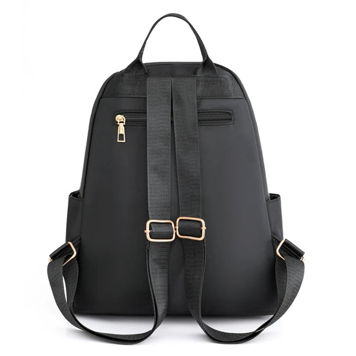 Aanbieding: Lichtgewicht waterdichte nylon dames rugzak; ideaal voor reizen & school (koop 1, krijg 1 gratis).