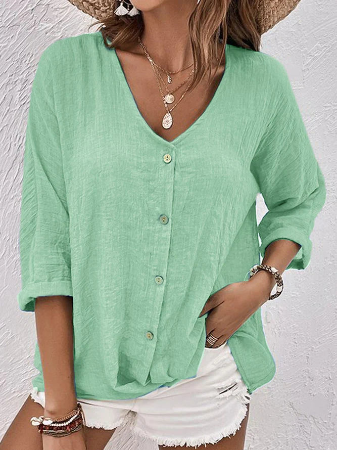 Lichtgroen linnen zomershirt voor dames met losse pasvorm en luchtige uitstraling, perfect voor warme dagen.