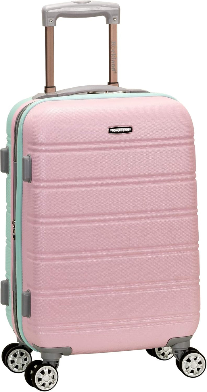 Lichtroze unisex handbagage koffer (Cotton Candy) met spinnerwielen, ideaal voor korte reizen.