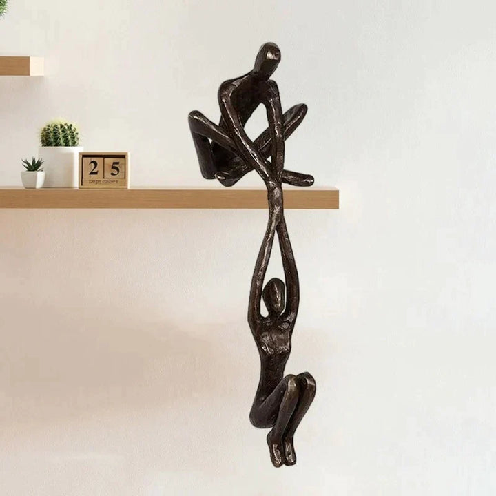 "Liefde en evenwicht sculptuur in bronzen hars, ideaal als unieke huisdecoratie voor tafels of schappen."