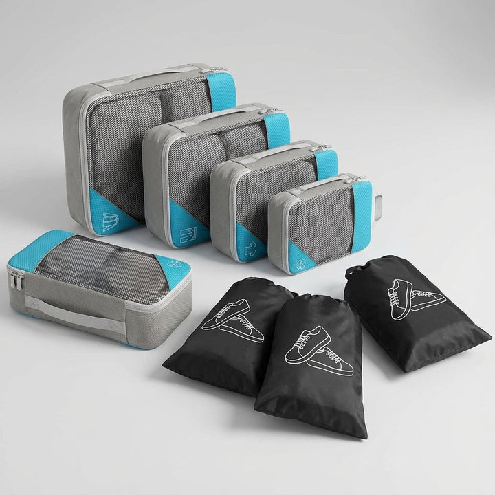 Georganiseerde bagage met LiteCube packing cubes set, perfect voor overzichtelijk inpakken van kleding op reis.