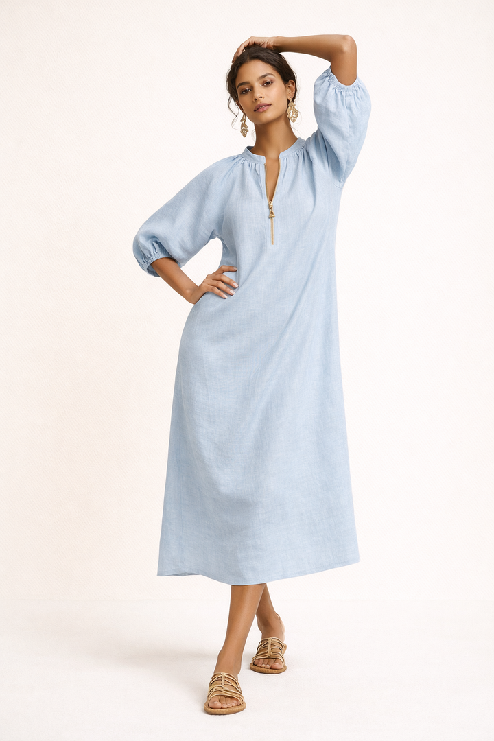 Comfortabele en veelzijdige lange zomerjurk voor dames, met korte mouwen en relaxte pasvorm.