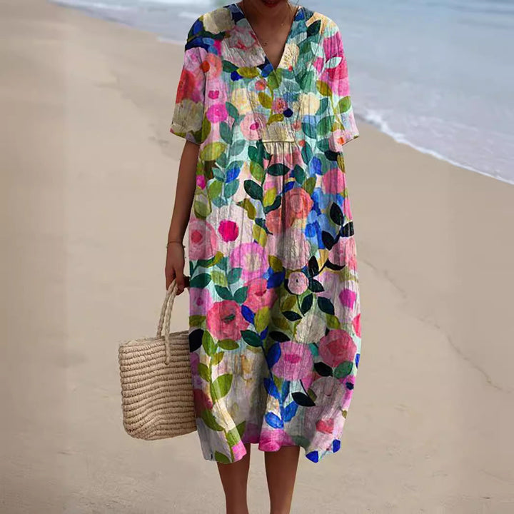 Lotte dames zomerjurk met bloemenprint en V-hals, een elegante en comfortabele jurk voor de zomer.