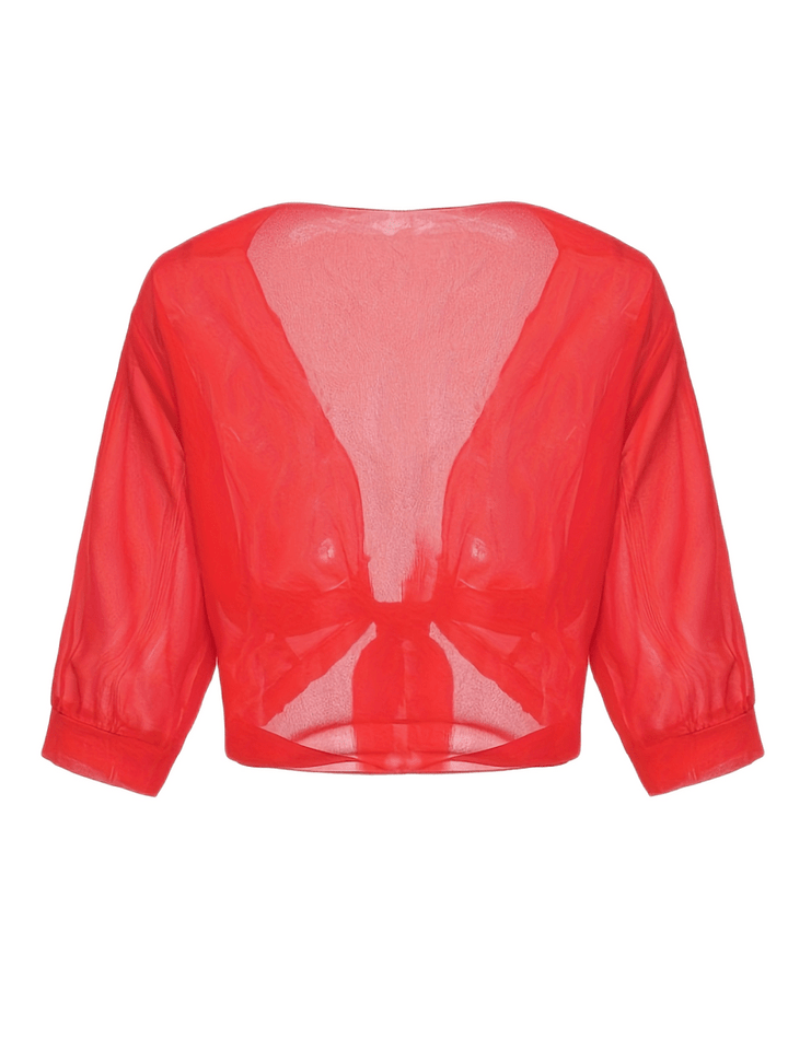 "Luchtige chiffon bolero met striksluiting en korte mouwen, elegant over zomeroutfits. Ideaal voor warme dagen en koele avond