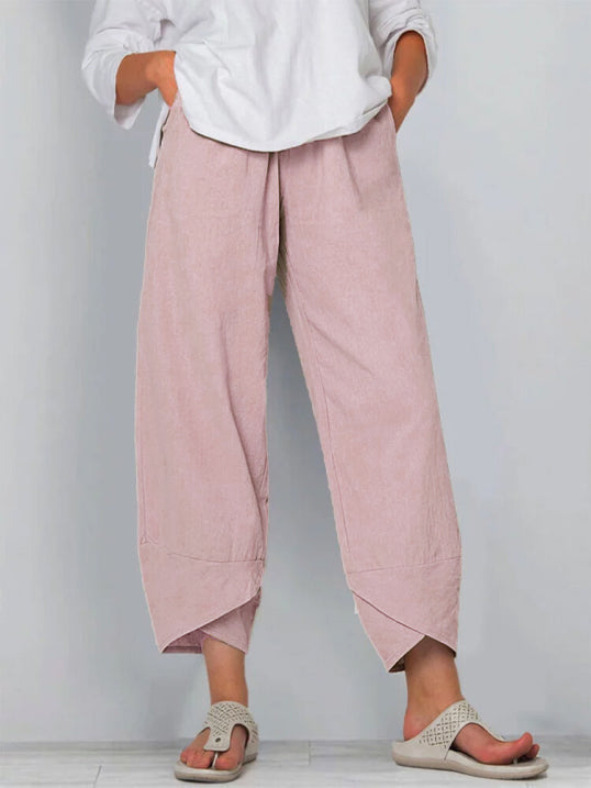 Casual luchtige cropped broek voor dames, minimalistisch en comfortabel, beschikbaar in meerdere kleuren.