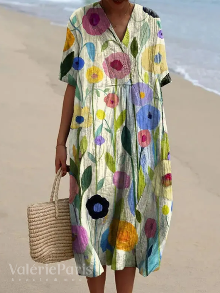 Flatterende damesjurk met bloemenprint, ideaal als casual jurk of strandjurk.