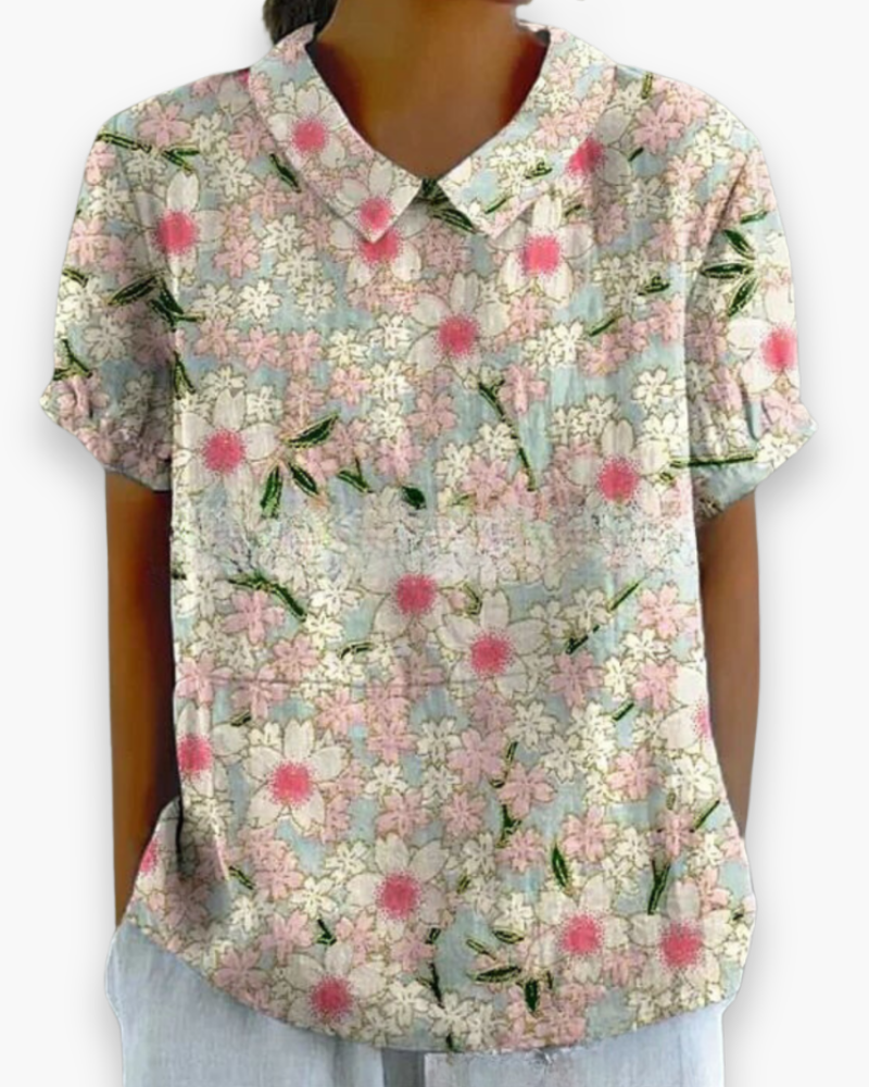 Casual damesbloes met bloemenprint, super comfortabel en luchtig, perfect voor een ontspannen zomerdag.