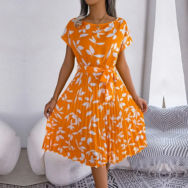 "Luchtige zomerjurk dames, elegante pasvorm, levendige kleuren, veelzijdig voor zomerse gelegenheden, vrouwelijk ontwerp."