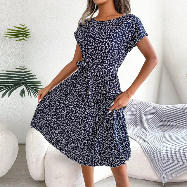 "Luchtige zomerjurk dames, elegante pasvorm, levendige kleuren, veelzijdig voor zomerse gelegenheden, vrouwelijk ontwerp."