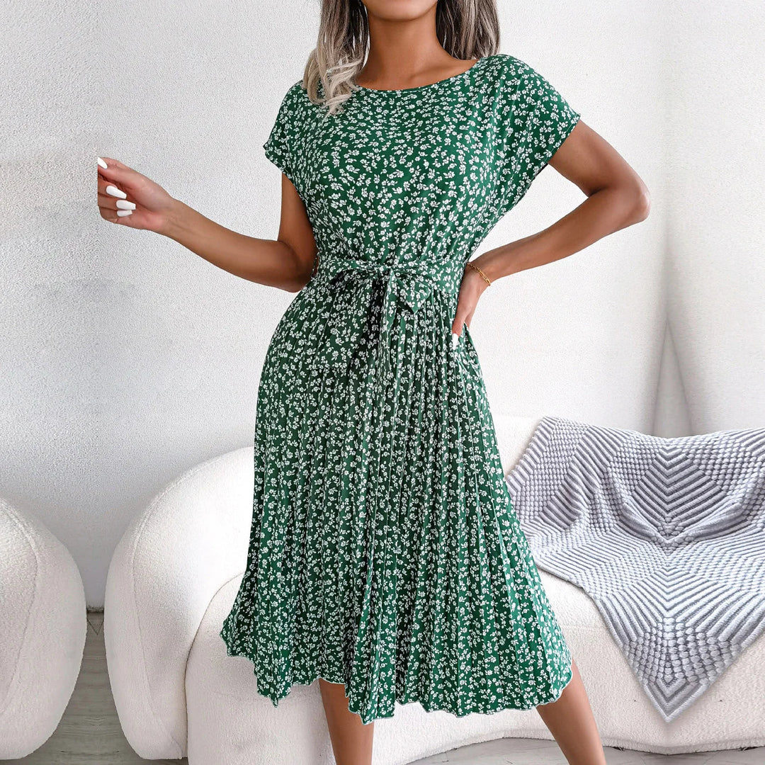 "Luchtige zomerjurk dames, elegante pasvorm, levendige kleuren, veelzijdig voor zomerse gelegenheden, vrouwelijk ontwerp."