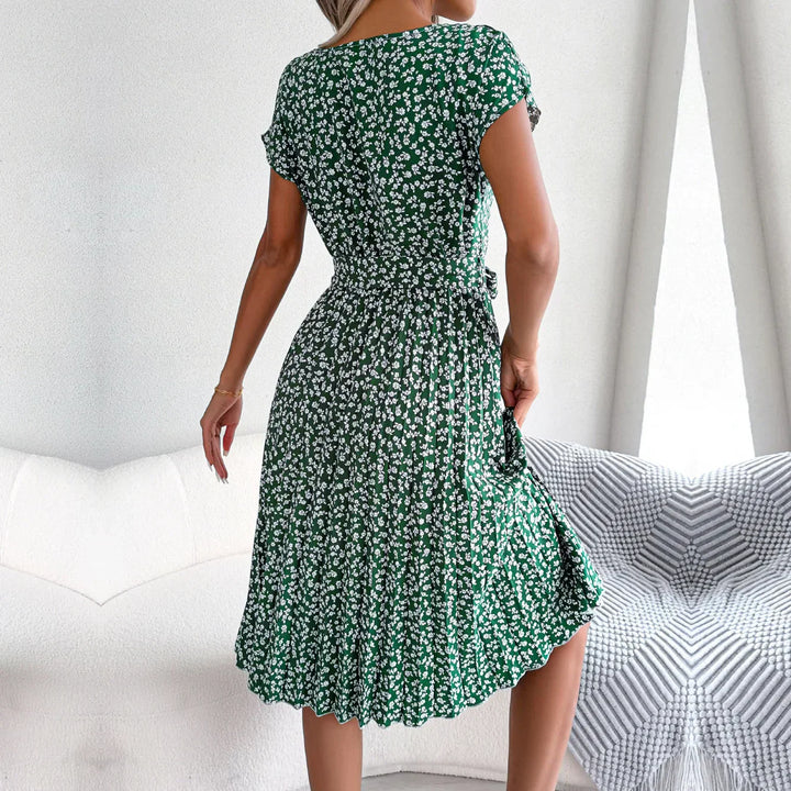 "Luchtige zomerjurk dames, elegante pasvorm, levendige kleuren, veelzijdig voor zomerse gelegenheden, vrouwelijk ontwerp."