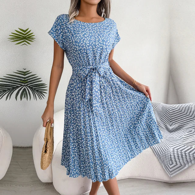 "Luchtige zomerjurk dames, elegante pasvorm, levendige kleuren, veelzijdig voor zomerse gelegenheden, vrouwelijk ontwerp."