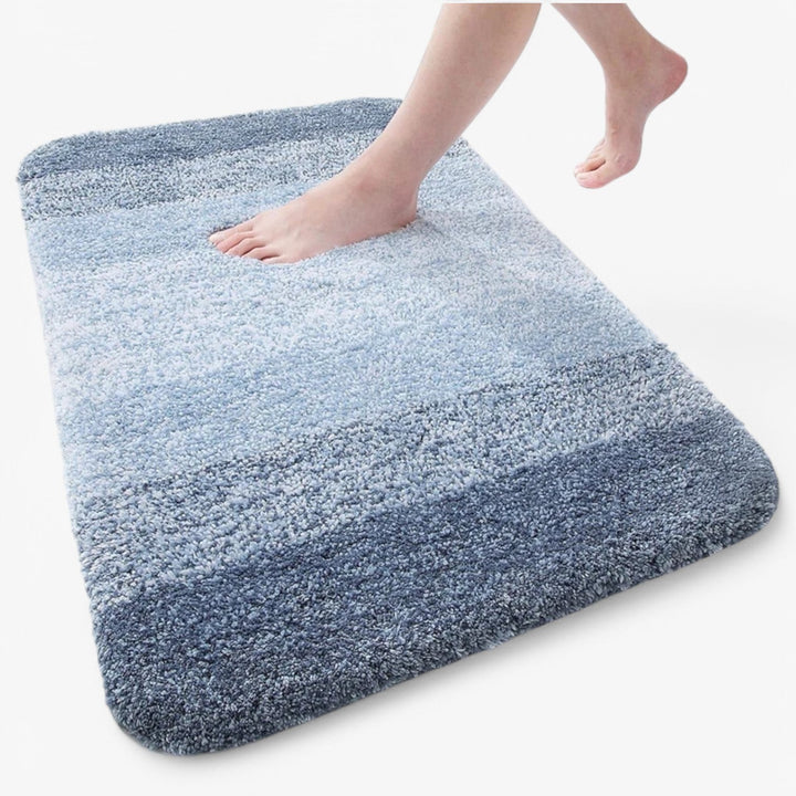 Sterk absorberende badmat, sneldrogend voor hygiëne, gemaakt van duurzaam en wasbaar microvezel badkamertextiel.