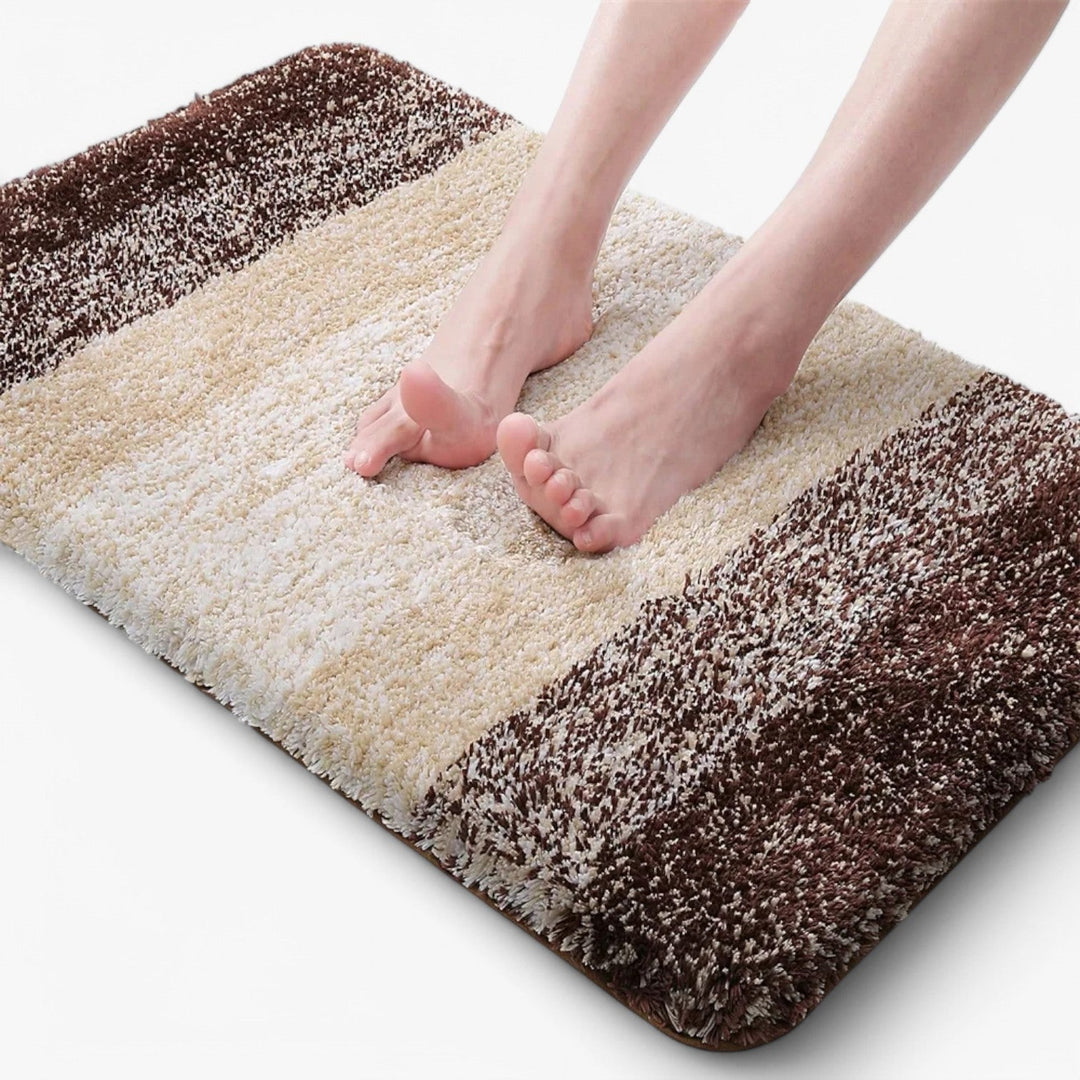 Zachte en absorberende microvezel badmat voor na het douchen, met antislip functie voor extra veiligheid en comfort.
