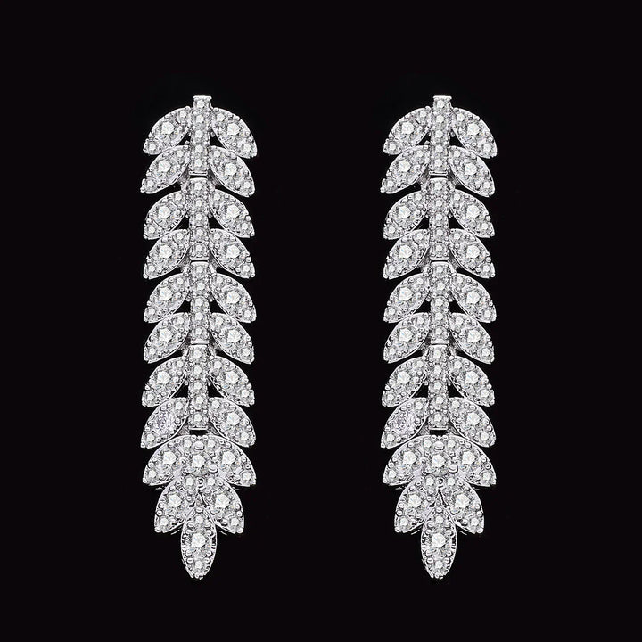 Exclusieve bruidssieraden: zirkonia halsketting en oorbellen set. Voegt glans toe aan elke bruidslook.