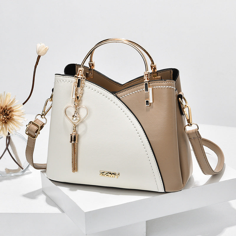 Luxe dames handtas en schoudertas van hoogwaardig PU leer. Stijlvolle en veelzijdige accessoire voor vrouwen.