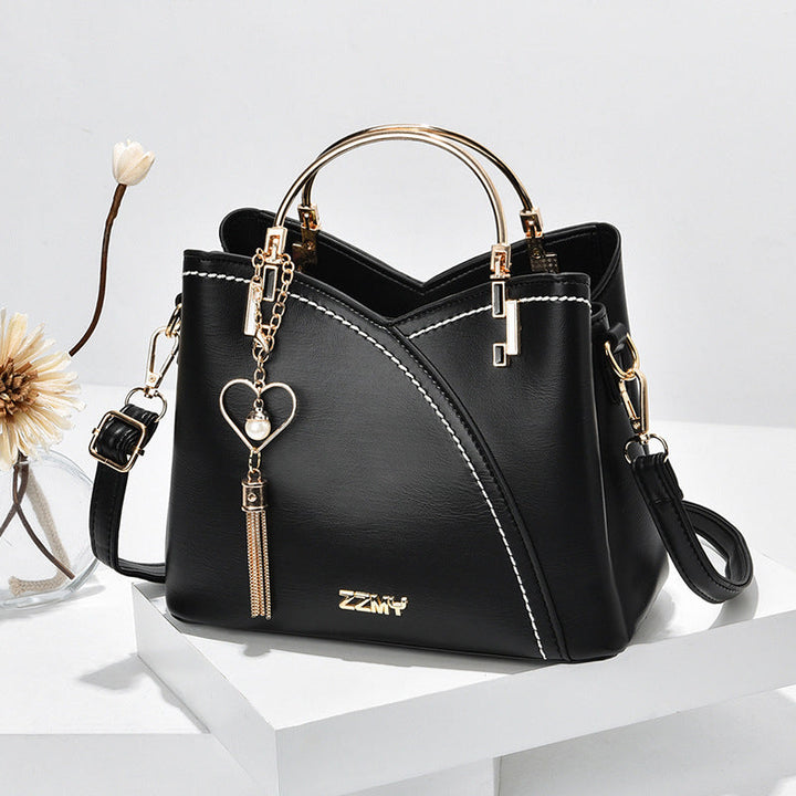 Veelzijdige dames handtas en schoudertas van hoogwaardig PU leer. Luxe accessoire met stijlvolle uitstraling.