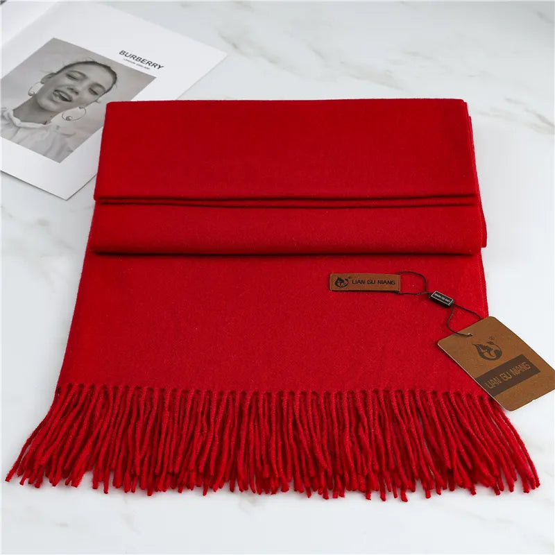 Elegante kasjmier dames sjaal met franjes, een stijlvol en modieus accessoire.