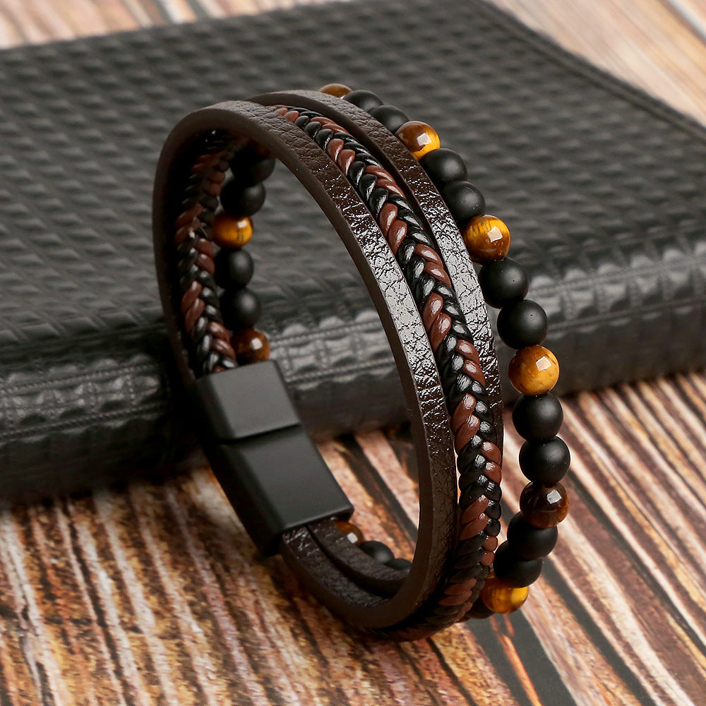 Luxe heren armbandenset met stijlvolle gevlochten bruine en zwarte armbanden, een elegante accessoire voor mannen.