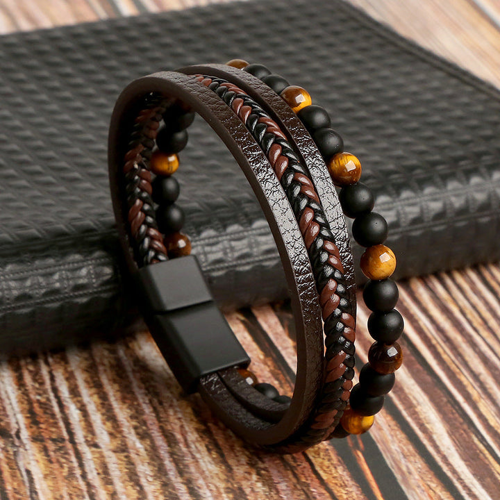 Luxe heren armbandenset met stijlvolle gevlochten bruine en zwarte armbanden, een elegante accessoire voor mannen.