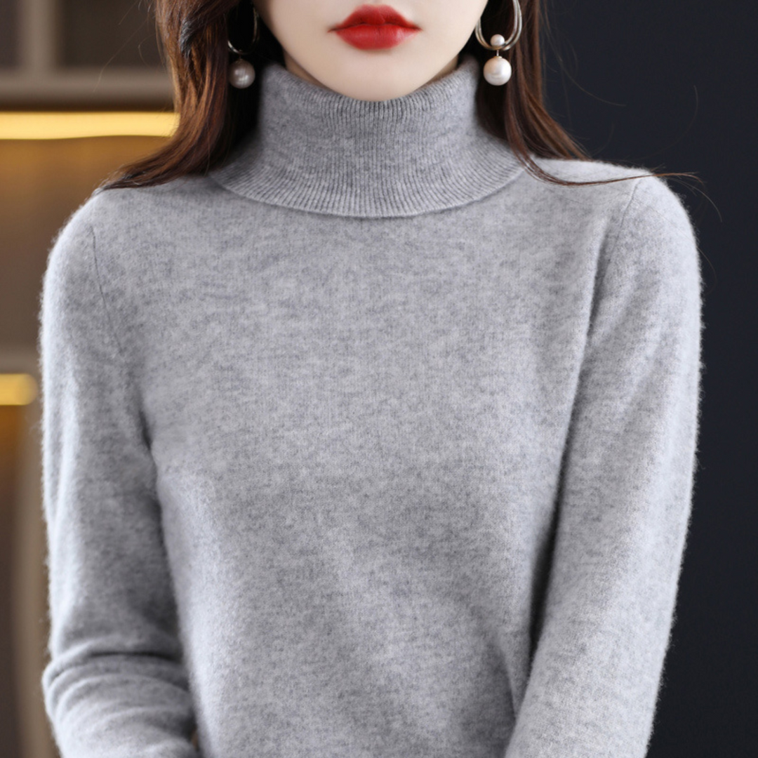 "Luxe kasjmieren coltrui voor dames met elegante colkraag in crème kleur, stijlvol en zacht, ideaal voor winterse outfits."