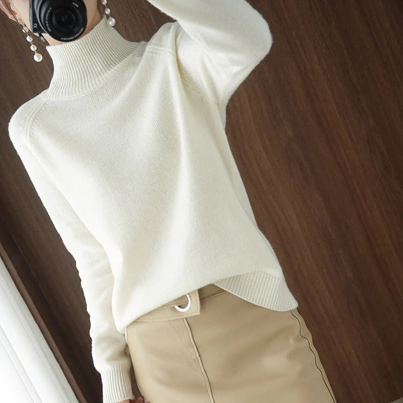Dames coltrui met hoge hals voor extra warmte en stijl. Comfortabele gebreide trui, perfect voor koude dagen.