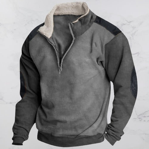 Grijze herenpullover met rits. Vintage stijl, comfortabel en machinewasbaar. Ideaal voor dagelijkse mannenmode.
