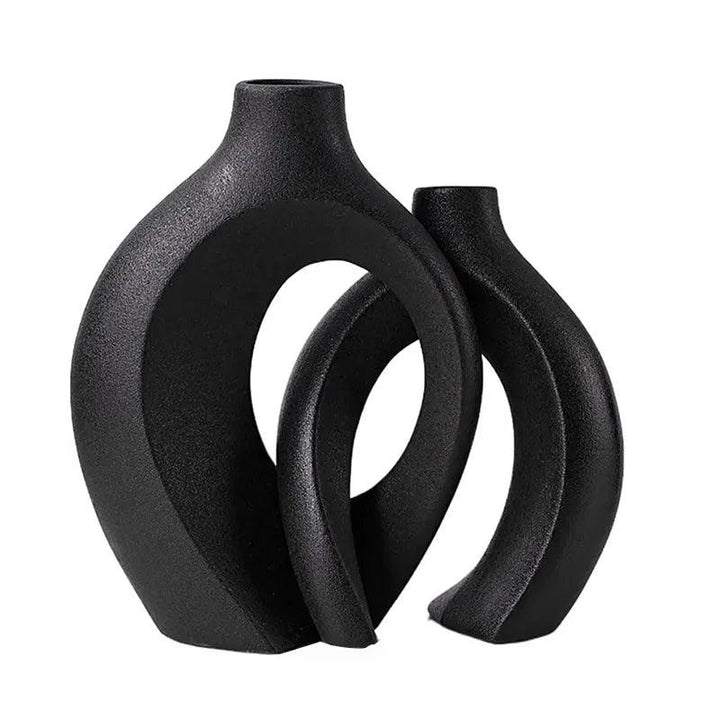 "Minimalistische keramische vazen set met elegante, stijlvolle vormen geschikt voor modern en klassiek interieur."
